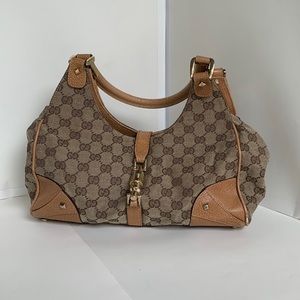 Tan Gucci canvas and leather handbag